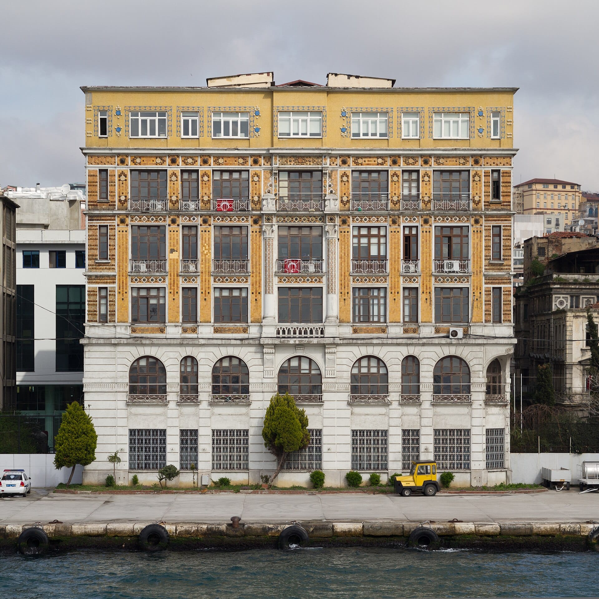 An ornate late-Ottoman apartment facade in Karaköy with carved stone details