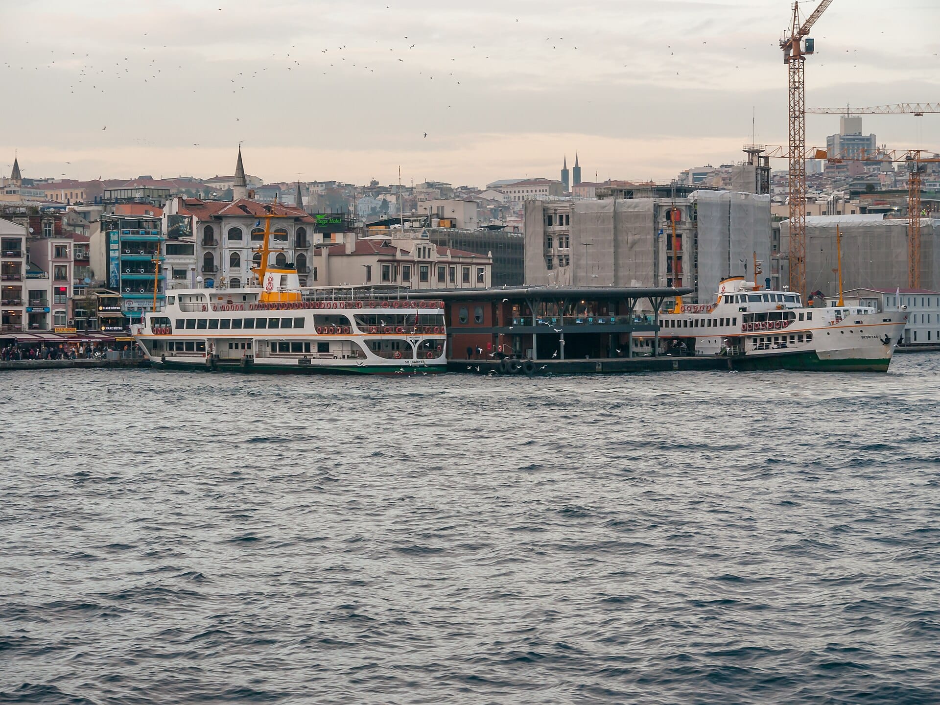 The Karaköy ferry pier on the Golden Horn with the old city skyline across the water
