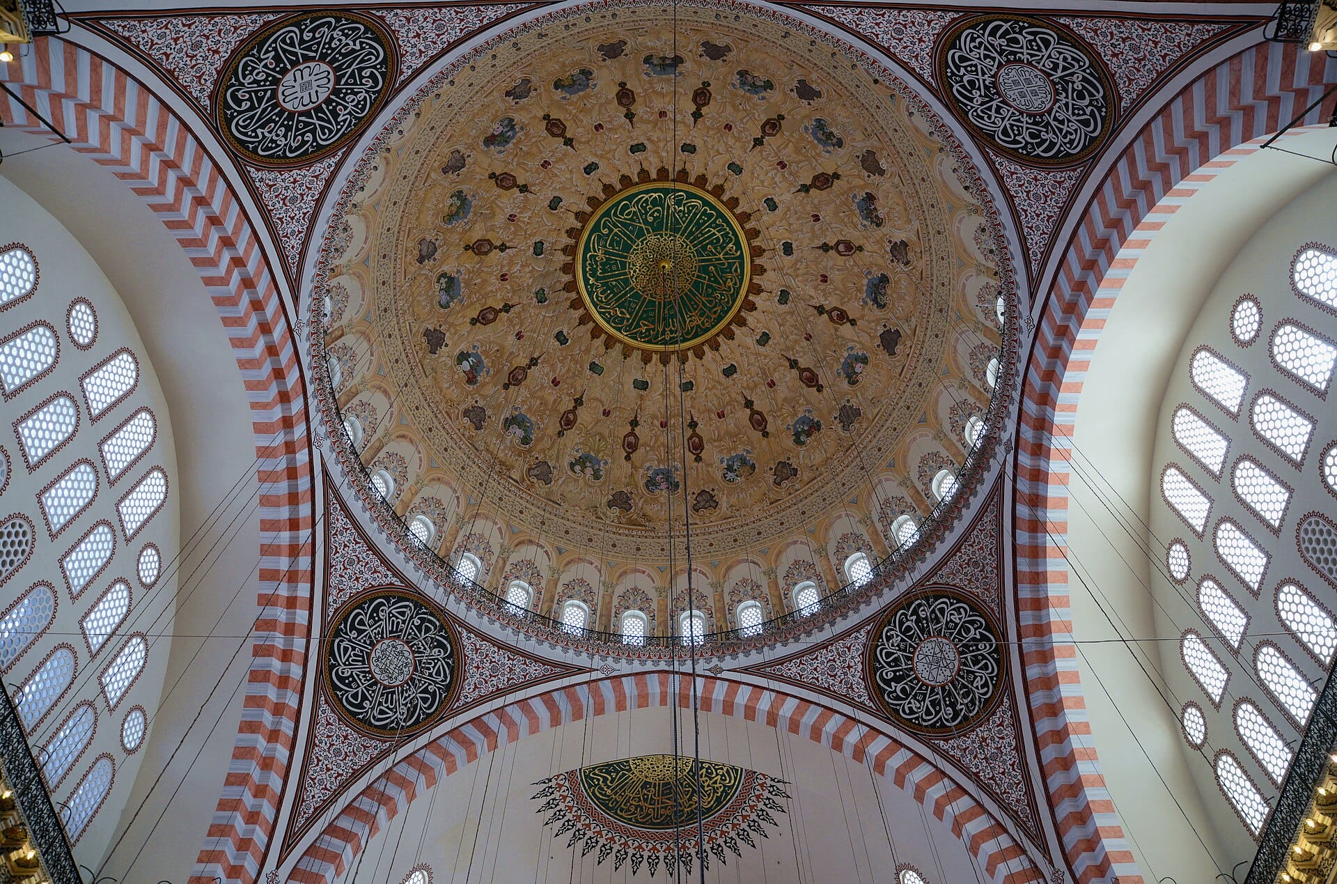 The painted central dome of the Süleymaniye Mosque seen from below